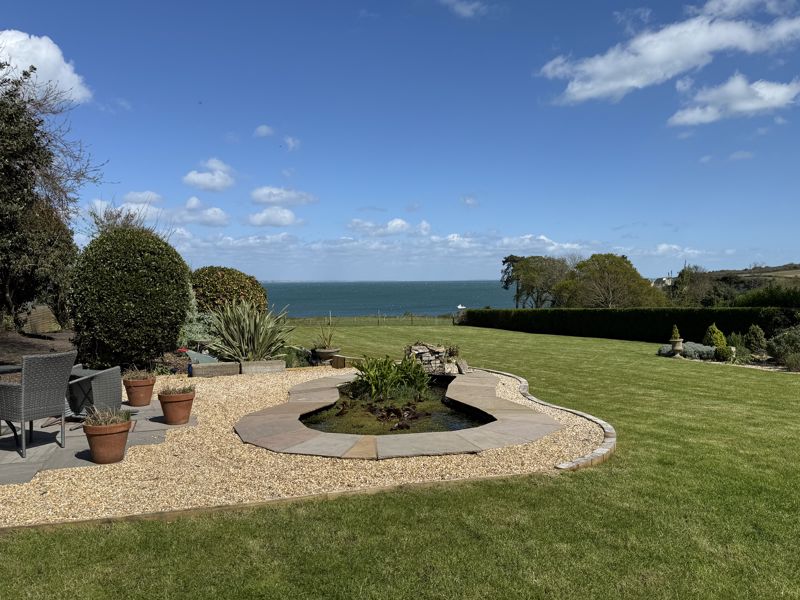 OFFERS INVITED – UNIQUE HOME ON LARGE LANDSCAPED PLOT WITH PANORAMIC SEA VIEWS